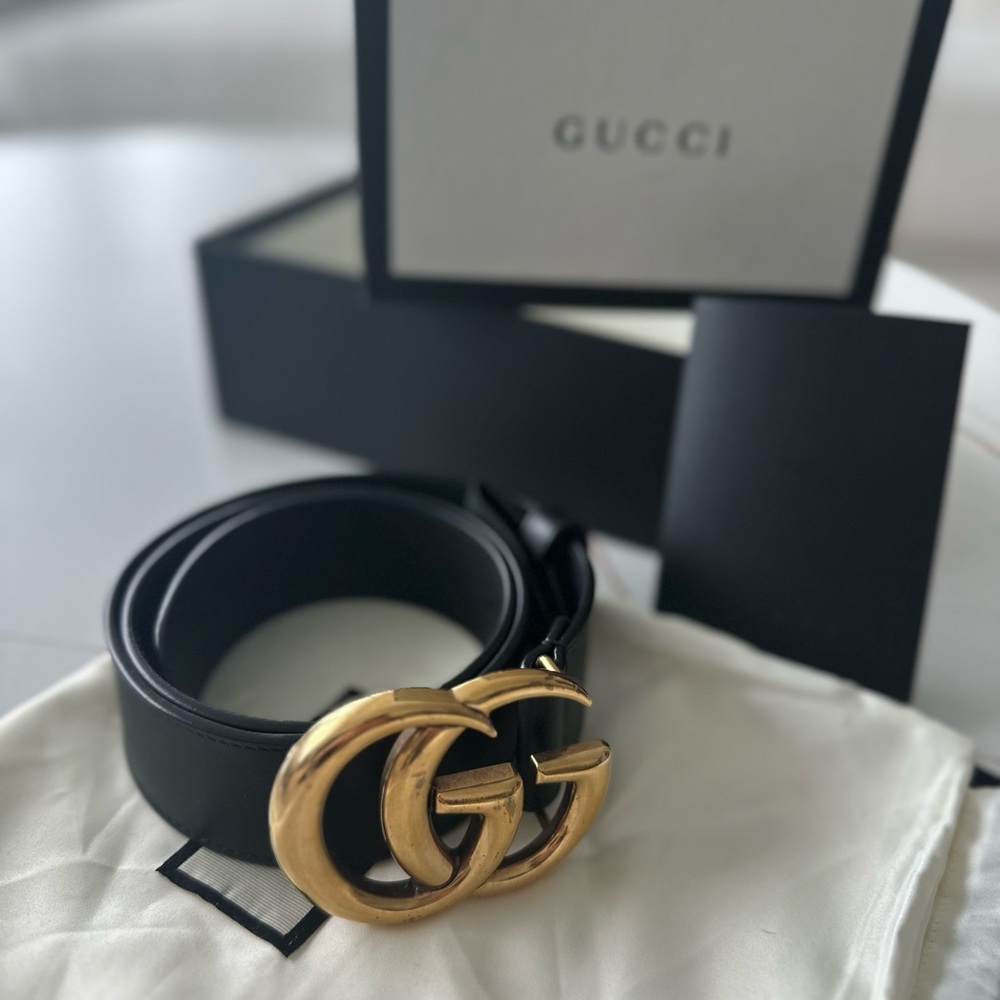 Gucci Black and Gold Leather Belt with Iconic GG Buckle